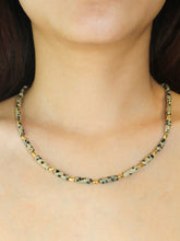 wearing Handmade Speckled Stone Bead Necklace